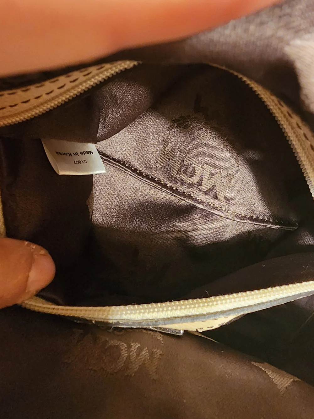 MCM cream leather Boston satchel featuring silver-toned hardware